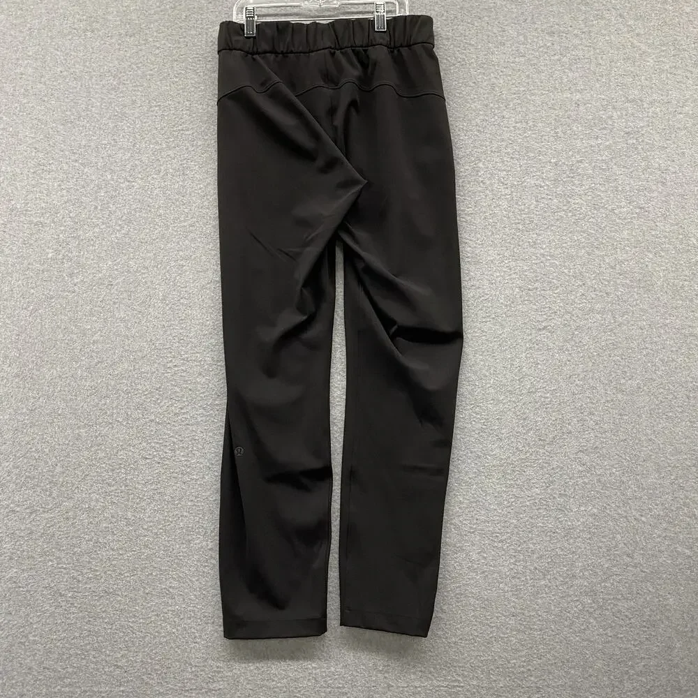 Lululemon On The Fly Pants Women 4 Black Luxtreme 28” Stretch Travel Tapered